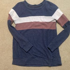 Pink Clover color block raglan sleeve knit top.